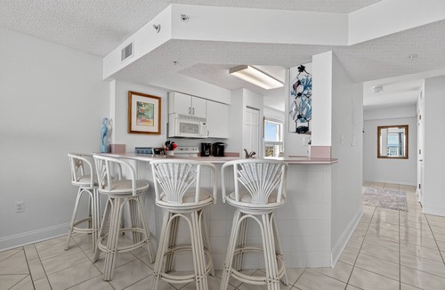 Seawinds Condo Condo | Direct oceanfront corner condo with spacious balcony and heated beachfront pool