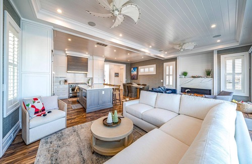 Stone Harbor House | Discover an extraordinary waterfront haven with this magnificent bayfront residence that boasts a.