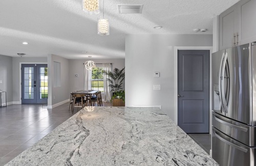 Haines City House | Disney Poolside Paradise for Relaxation, Celebration & Work