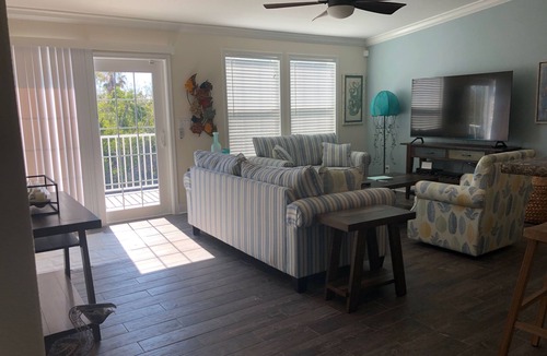 Doctor's Arm House | Doctors Arm waterfront with pool and Tiki hut. Ocean and backcountry access.