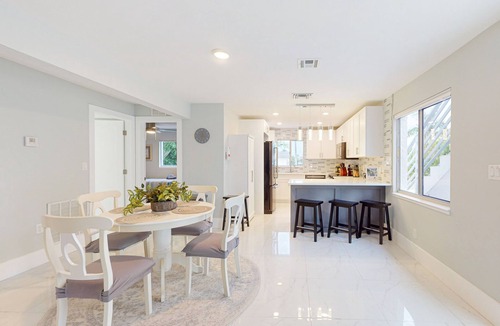 Isles of Capri Condo | Dog-friendly colorful condo with shaded patio, washer/dryer, & central AC