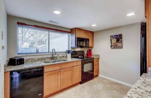 Folly Field Condo | Dog Friendly Condo with Fast WiFi, a Patio, & Shared Pool Walk to the Beach
