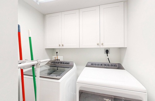 Isles of Capri House | Dog-friendly duplex with a patio, deck, washers, dryers, & central AC