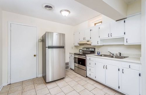 Flat Rock Condo | Dog-friendly gem on the lake with pool, beach, lush acreage, fast WiFi & kitchen