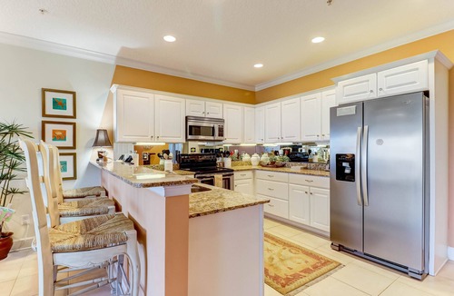 Ocean Cay Condo | DOG FRIENDLY! Luxurious and professionally decorated townhome across street from beach.