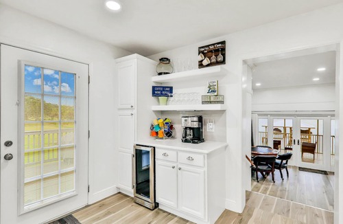 Sebring House | Dog-friendly lakefront home with fast WiFi, central AC, patio, & game room