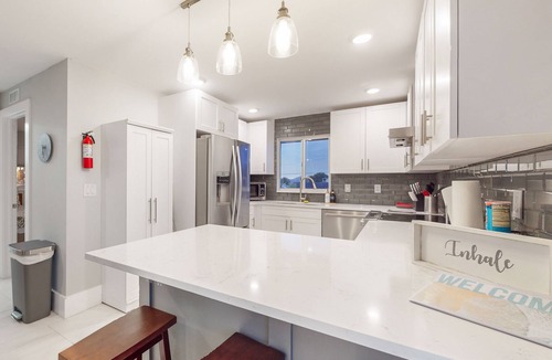 Isles of Capri Condo | Dog-friendly single-level condo with furnished patio, rooftop, & washer/dryer