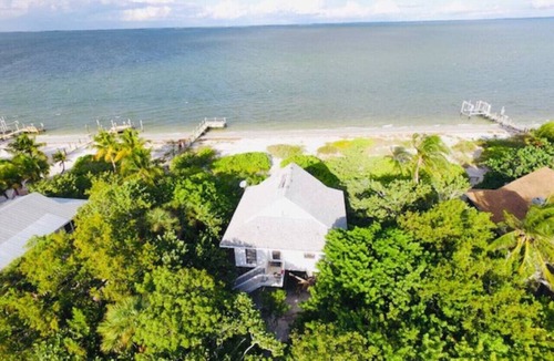 North Captiva House | Dolphin Cottage: Beachfront Home with Stunning Views & Private Beach
