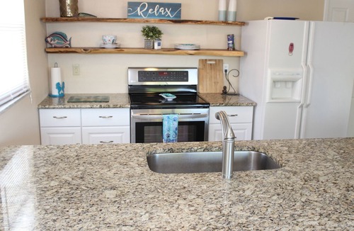 Port Richey House | Dolphin Cove Getaway - 3 bedroom waterfront, floating dock, with water "toys"!