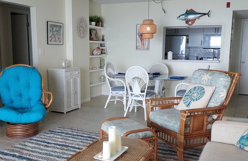 East Wind South Condo | Dolphin View-oceanfront condo with large balcony overlooking no drive beach.