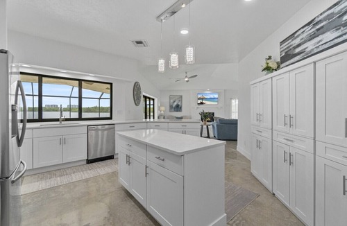 Bonita Bay House | DolphINN View Getaway - Bayfront Escape w/ Pool, Dock & 8-Min Walk to Beach