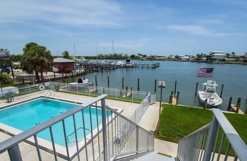 Isles of Capri Condo | Driftwood Landing (1-Bedroom Condo) with Pool by RedAwning
