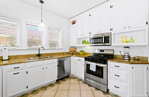 Lake Park House | Elegant 1926 Mediterranean Villa Heated Pool/Spa Sleeps 8