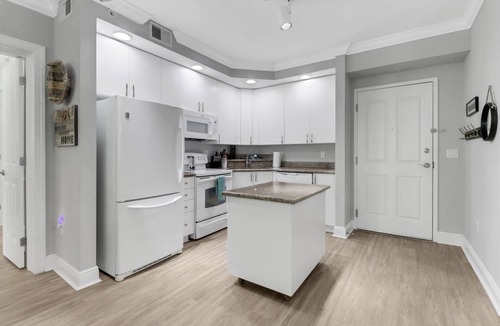 Fort Myers Condo | Elegant, Upscale Waterfront Condo! Unforgettable Sunsets! Stunning Pool & Pool Deck! Free Parking