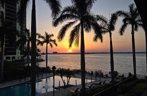 Fort Myers Condo | Elegant, Upscale Waterfront Condo! Unforgettable Sunsets! Stunning Pool & Pool Deck! Free Parking