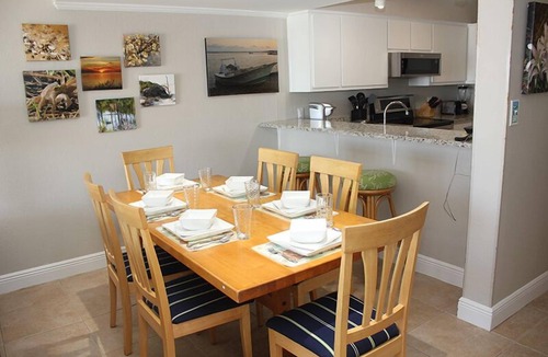 St. George Island Condo | EMBRACE NATURAL BEAUTY with elegant refinement. Exquisite decor emulates a tropical paradise.
