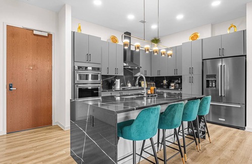Peachtree Center Condo | Emerald Grand: 27th Floor Penthouse in ATL | 14ft Ceilings, FIFA & Skyline Views