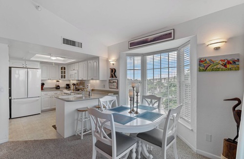 Palm Island Villa | Enjoy a Beautiful Gulf Sunset from the Screened Porch on Resort Villa A3221B