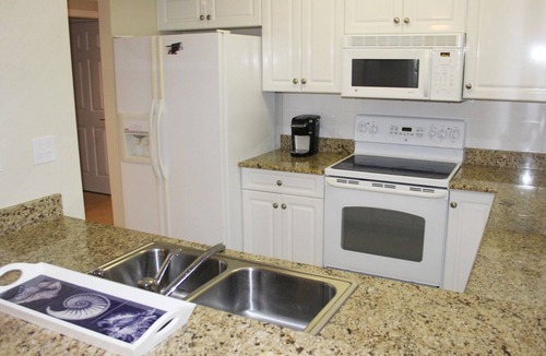 New Smyrna Beach Condo | Enjoy breath taking sunsets| Oceanwalk Condo w/Estuary Views! OW10-403