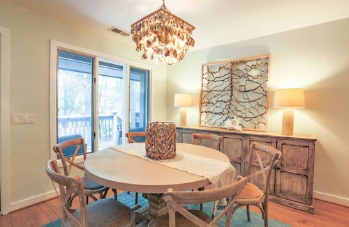 West Beach Condo | Enjoy Stunning River Views, Community Pool & Beautiful Furnishings, Dog Friendly. Walk to Beach!