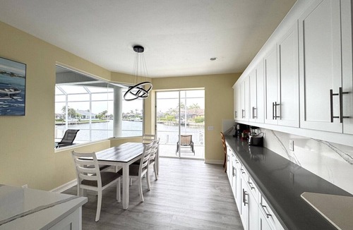 Marco Island House | Enjoy Sunny warm days, lounging poolside at this home