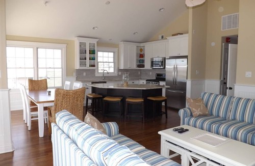 Avalon Condo | Enjoy the beautiful bay and sunset views from this top floor condo