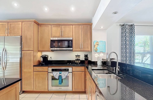 Naples Park House | Epic Arcades Heated Pool Home by Beach & Mercato