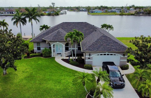 Burnt Store House | EPIC VIEWS! HUGE DOCK! Direct Salt Water Access - Water Front & Peaceful