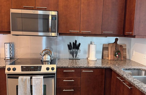 Atlantic Station Area Condo | Exclusive 2-Bed Loft in Atlantic Station—A Unique FIFA Escape.