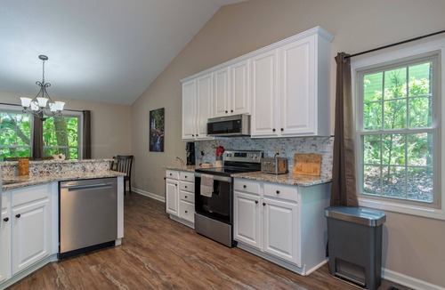 Brevard House | Experience comfort at Deer Moments, a spacious 3BR home in scenic Connestee Falls, NC.