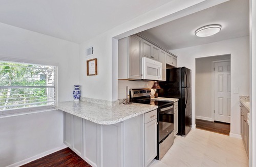 Parker Ridge House | Experience Serene Living: Charming 3/1 Home Walk to New Public Golf Course WPB!"