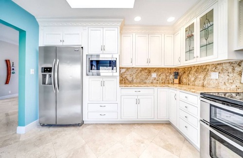 Cypress Lakes House | EXQUISITE HEATED POOL+WATERFRONT! 1 MILE TO BEACH!