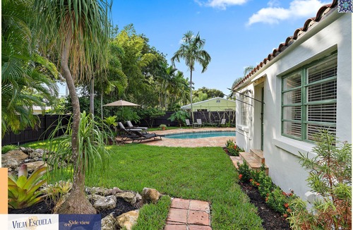 Old Northwood Historic District House | Extraordinary Getaway: Historic School Transformed into Luxury Oasis