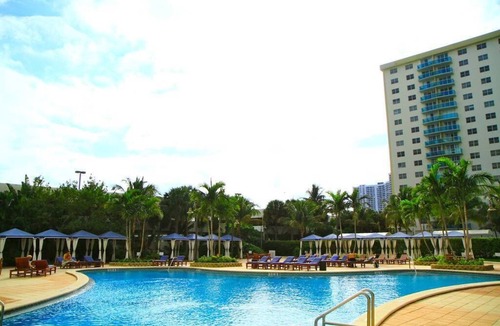 Sunny Isles Beach Condo | F-302 - Beautiful view of pool and gardens! Walk to beach!
