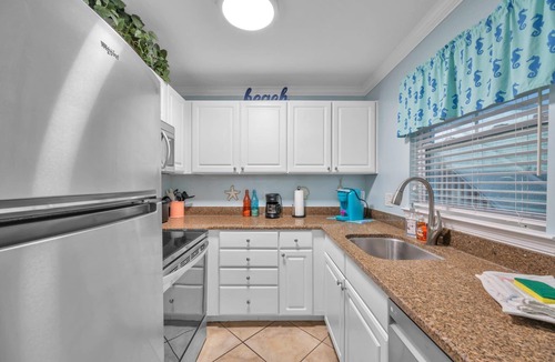Indian Shores Condo | FABULOUS ! !DIRECT"WATERFRONT"1st FloornWalk to Beach! COZY King Bed