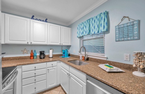 Indian Shores Condo | FABULOUS ! !DIRECT"WATERFRONT"1st FloornWalk to Beach! COZY King Bed