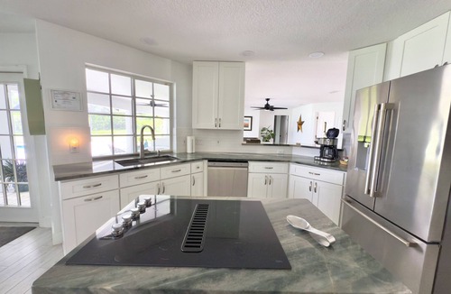 Astatula Villa | Fabulous lakefront villa 4 bedrooms with pool, spa, fitness room, ping-pong .
