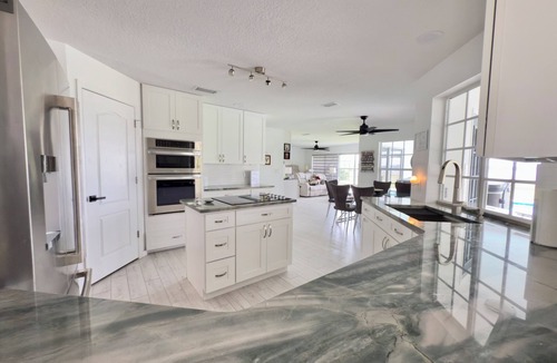 Astatula Villa | Fabulous lakefront villa 4 bedrooms with pool, spa, fitness room, ping-pong .
