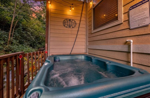 Chalet Village North Cabin | Falling Brook – Cozy Creekside Cabin with Hot Tub, Game Loft & Dog-Friendly Comfort