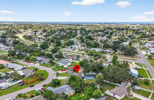 Apollo Beach House | Family 3BR Apollo Beach Oasis Heated Pool BBQ CornHole