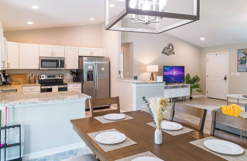 Englewood East House | Family Beach Retreat w/Private Fenced Backyard, Fire Pit, Games