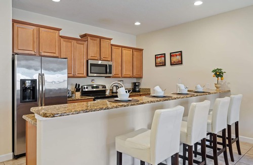 West Kissimmee House | Family-Friendly 4BR Townhome w/Private Pool & BBQ – 20 Mins to Disney!