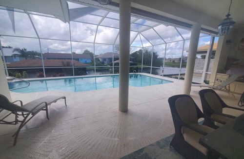 Palm Harbor House | Family-Friendly Canal Home w/Saltwater Pool