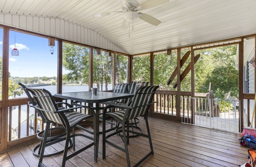 Greenwood House | Family - Friendly Lakefront Home with a Covered Boat-slip.