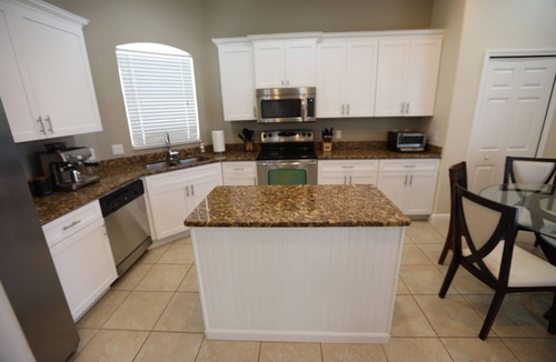 Rotonda Heights House | Family & Pet Spa-Like Stay Heated Pool & Steam Shower , King Bed, 12 min beach!