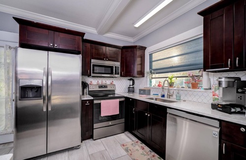 South Seminole Heights House | 🦩Flamingo Haven! Luxury Home with Private Heated Pool and Amenities Galore!