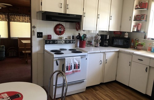 Orange City House | Flamingo Landing is a Charming Little 2 Bedroom Bungalow With Florida Room