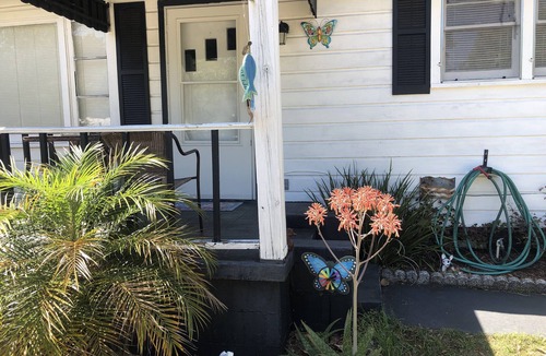 Orange City House | Flamingo Landing is a Charming Little 2 Bedroom Bungalow With Florida Room