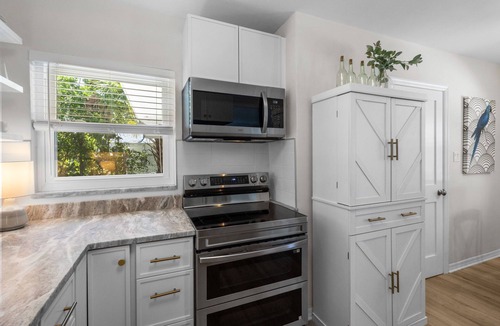 South Pinellas Community Council House | Flamingos Nest - Madeira Beach Pool Home with private Guest House