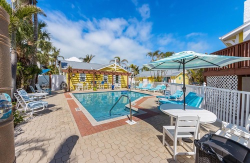 Anna Maria House | Flirty Flamingo Cottage Updated beach cottage, moments from the sand, w/pool!